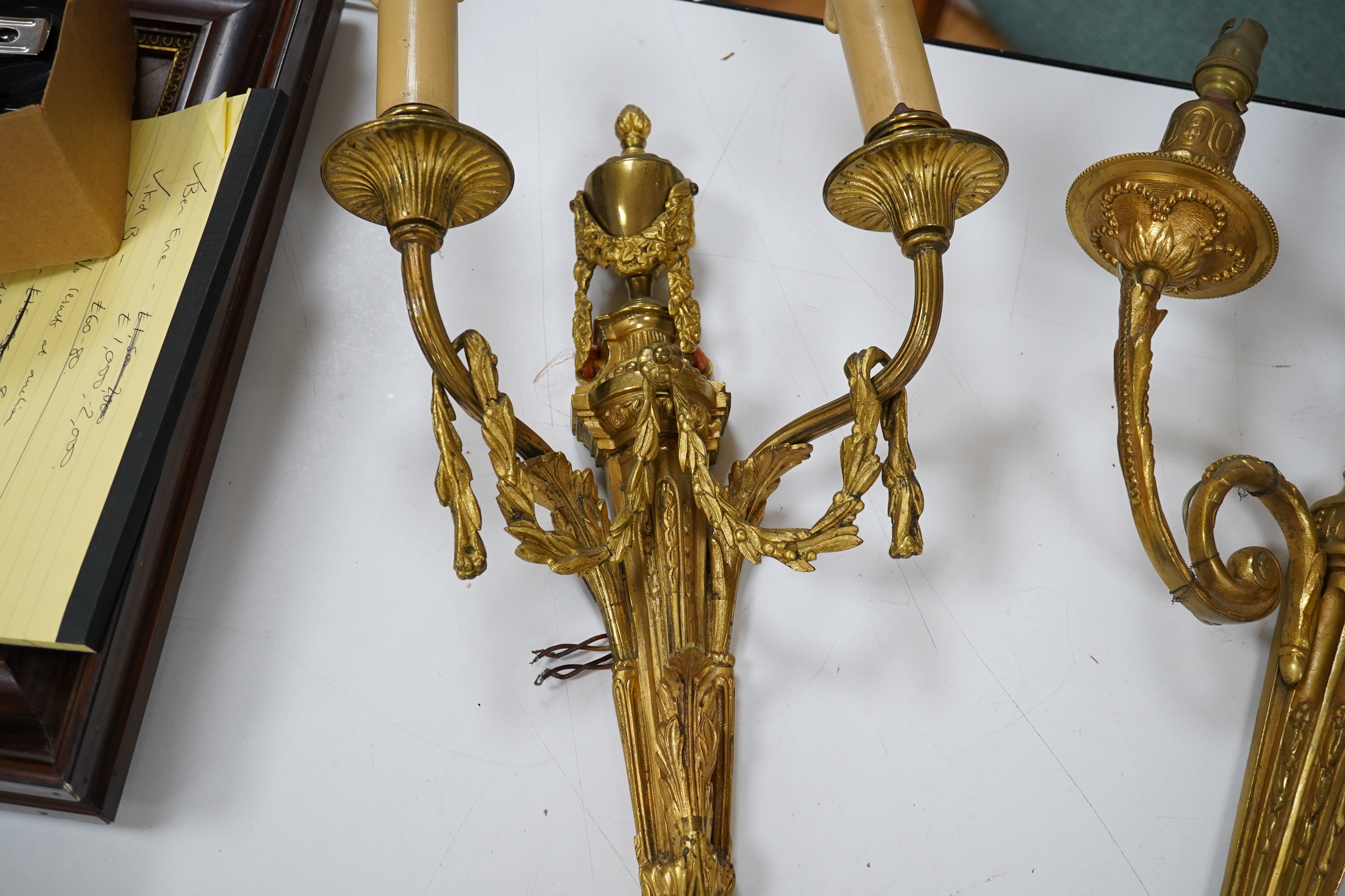 Two early 20th century ormolu wall sconces, largest 44cm. Condition - fair to good